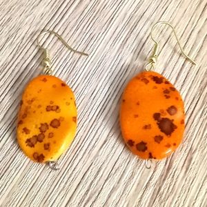 Hand crafted earrings orange and brown speckled essential drop